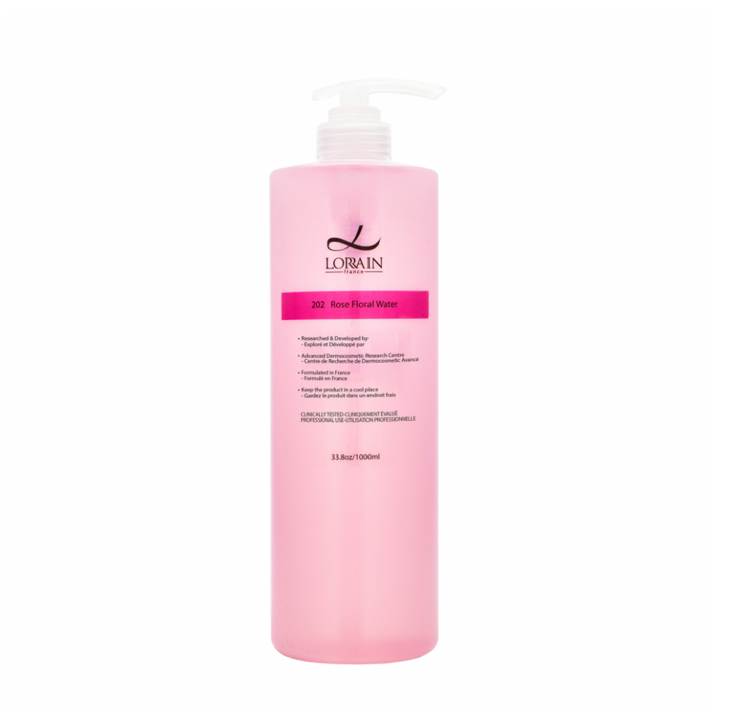 LORRAIN 玫瑰花水 1000mlA 250 ml bottle of L'Oréin Rose Floral Wash, featuring a translucent pink bottle with a white pump dispenser and a white label with a magenta accent band.