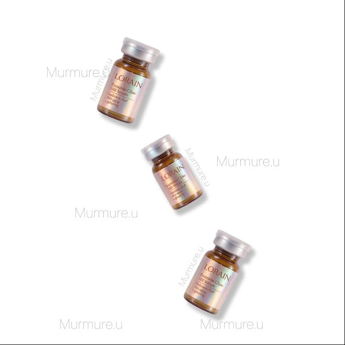 LORRAIN 時光100精華 10x5mlThree bottles of L'Oreal hair product on a white background